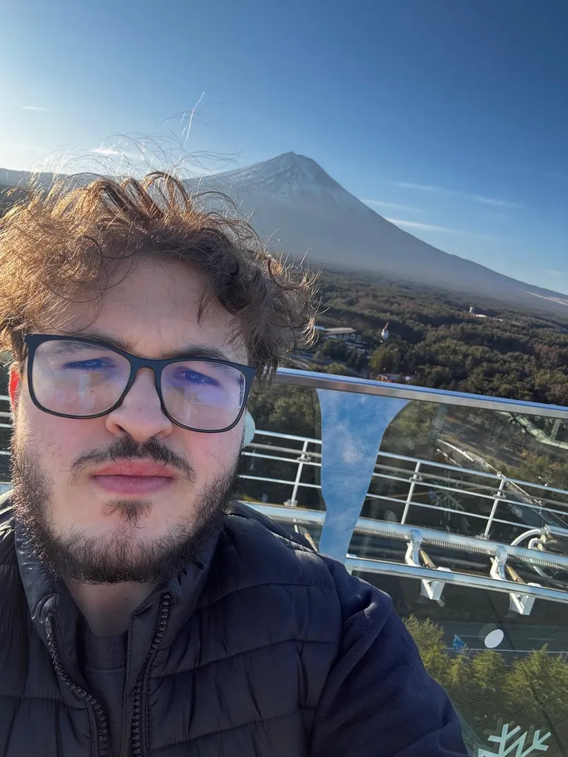 Ahmed Boubakry with Mount Fuji in the background on a clear day